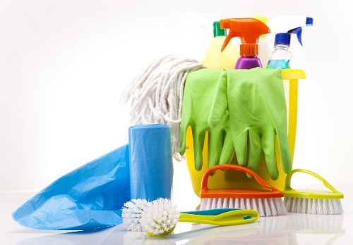 Local office cleaning team working in a Finsburypark office kitchen