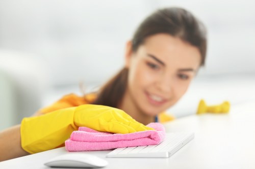 Commercial cleaning team working in a Finsbury Park office reception area